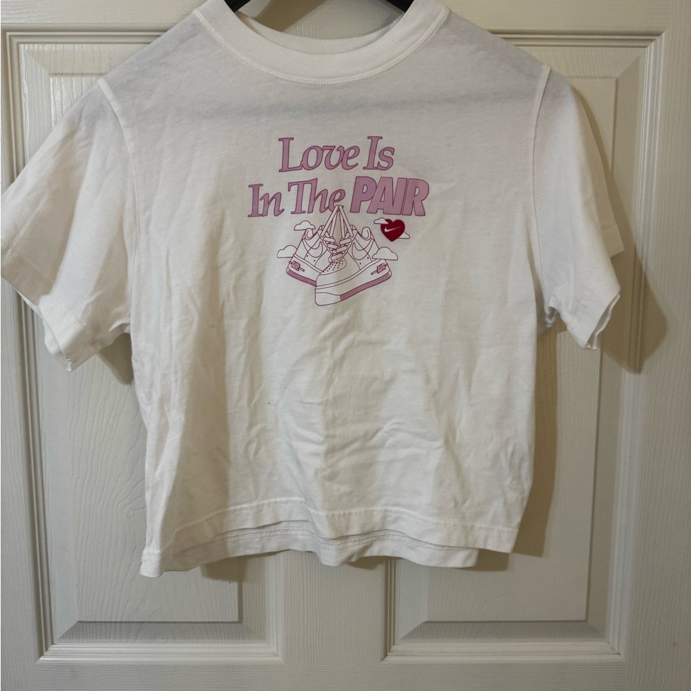 Nike White Tee with Pink 'Love Is In The Pair' Graphic